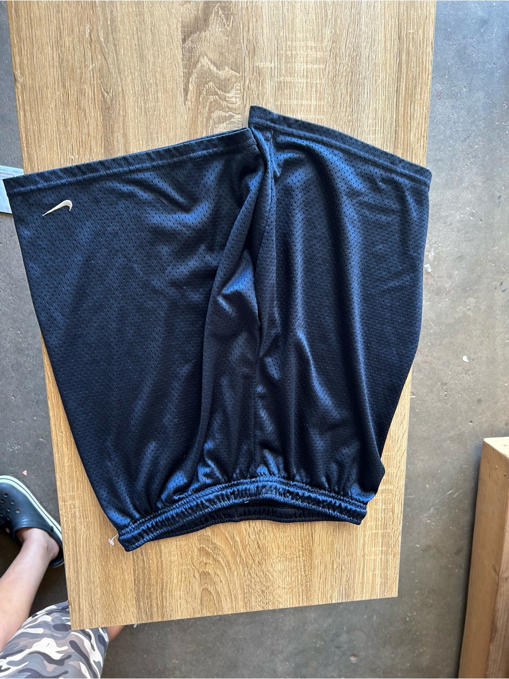 Nike Black Mesh Athletic Shorts with White Swoosh